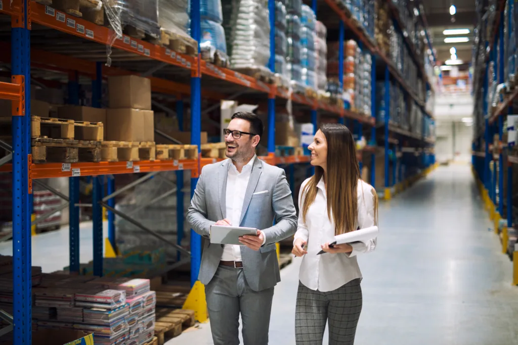 Businesspeople in a warehouse