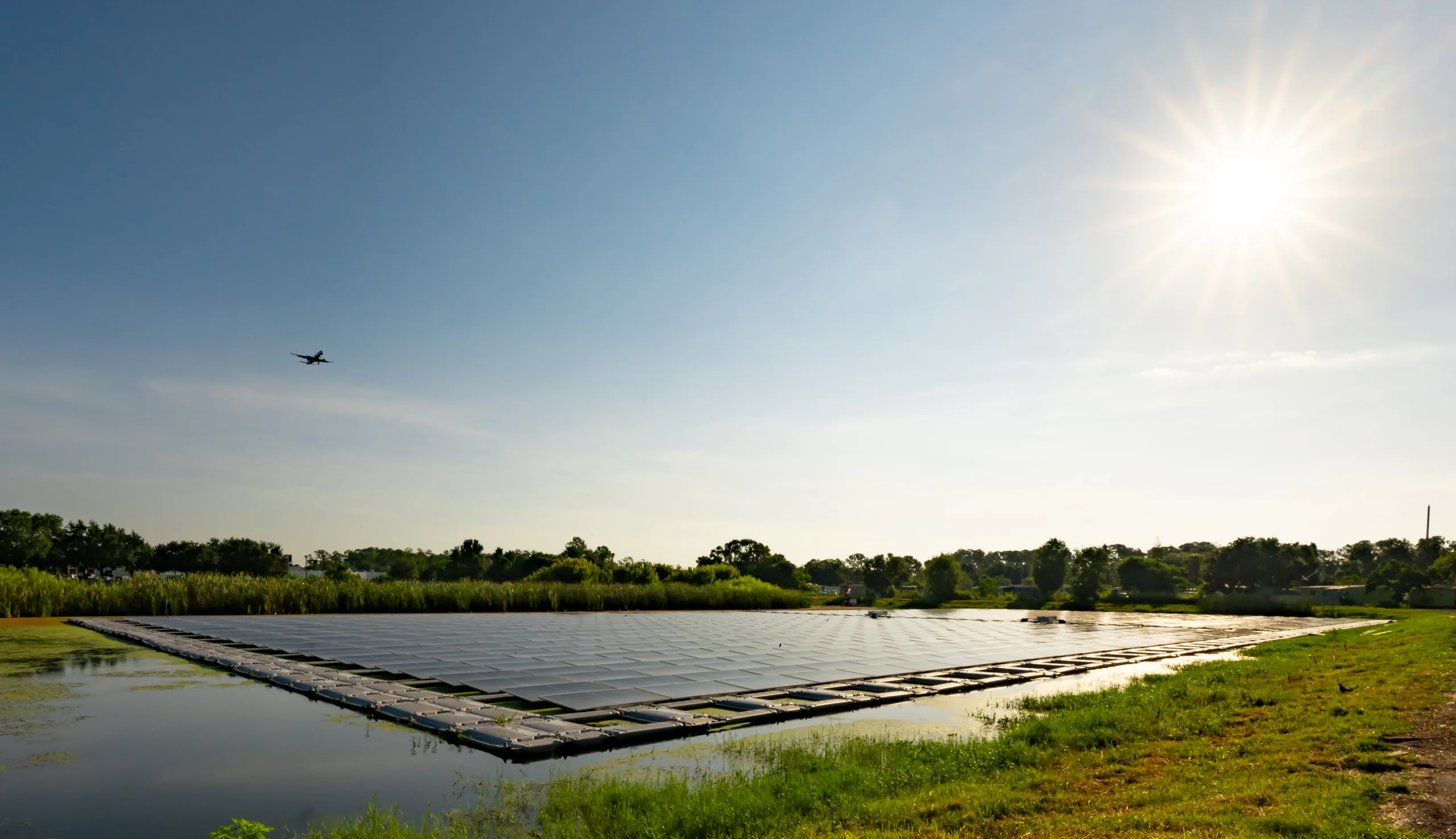 Solar panels floating in body of water