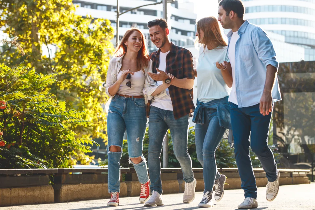 Friends walking and talking in downtown Orlando